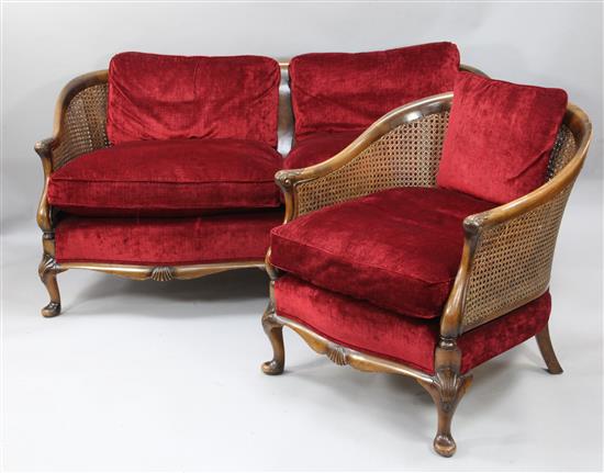 A 1930s walnut three bergere suite, settee W.5ft 8in. H.2ft 8in.
